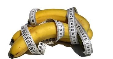 banane dhe centimetër si një imitim i rritjes së penisit